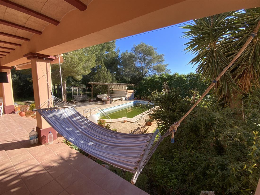 Mooie bungalow dicht bij ibiza met uitzicht op Dalt Villa