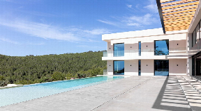 Luxe villa met vier slaapkamers in Cas Mut met een prachtig uitzicht op de oceaan